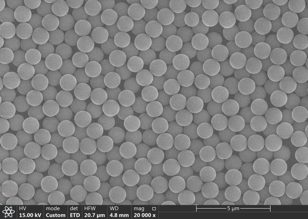 SEM images of 1 um polystyrene microspheres